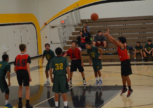 Andrew Cabato takes a free throw in a basketball game against St. Raymond in the Bosco Tech Tournament.